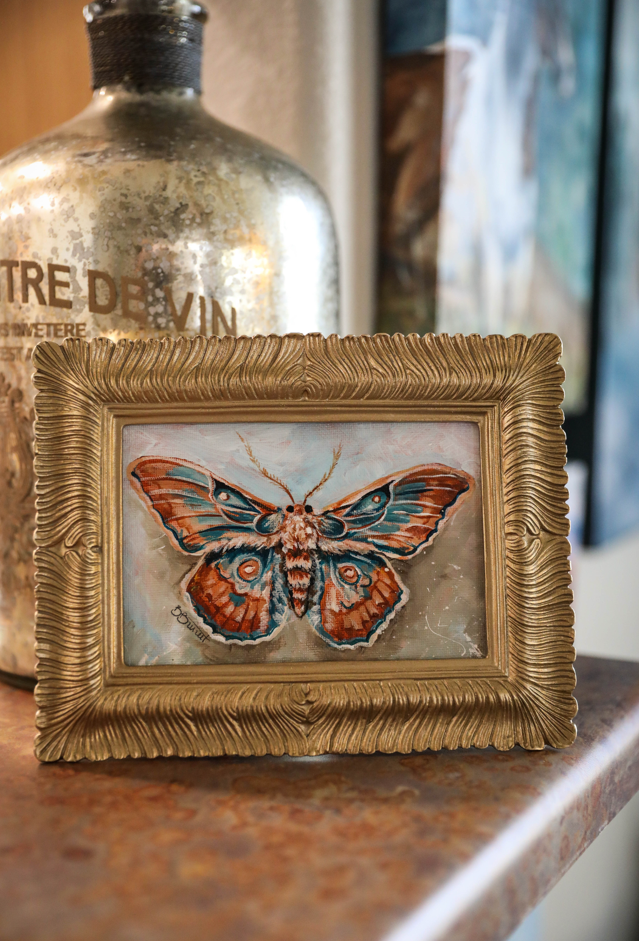 Teal Moth